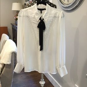 White with black tie blouse